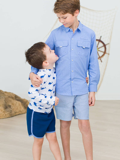 RuffleButts + RuggedButts - Boys Navy Dolphin Hem Swim Trunks