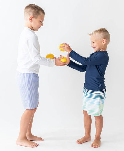 RuffleButts + RuggedButts - Boys White Long Sleeve Rash Guard