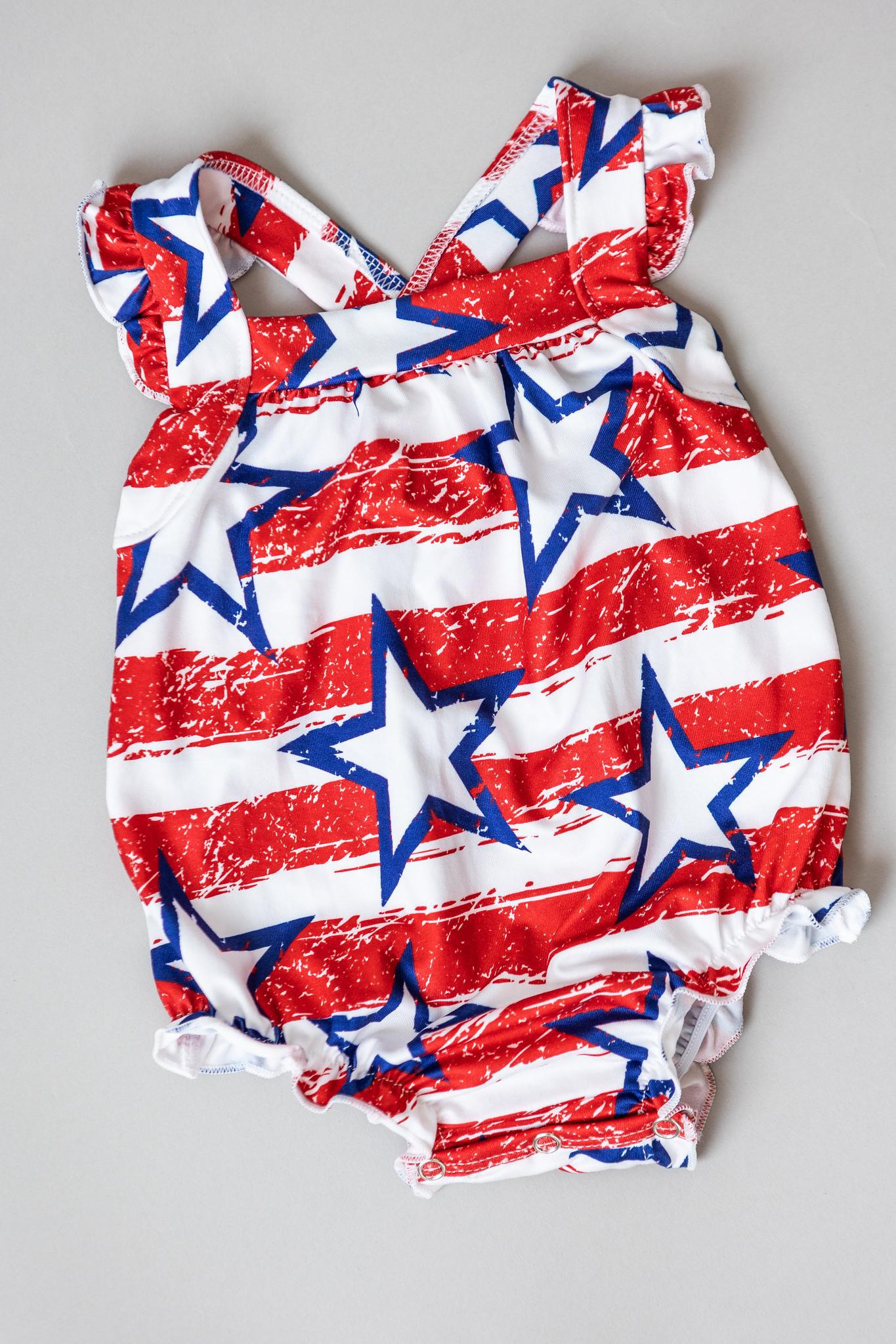 Mila & Rose:  Stars & Stripes Ruffle Cross Back Romper SHIPS SEPARATELY