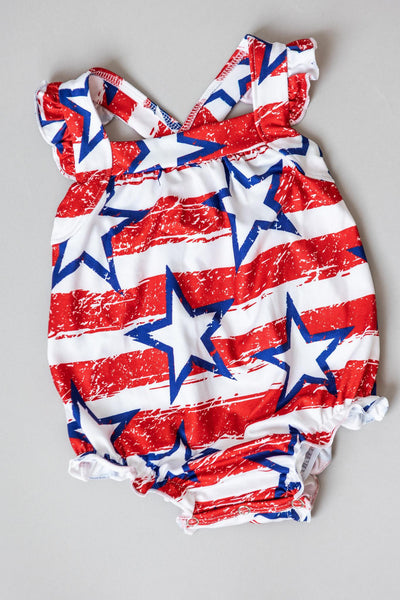 Mila & Rose:  Stars & Stripes Ruffle Cross Back Romper SHIPS SEPARATELY