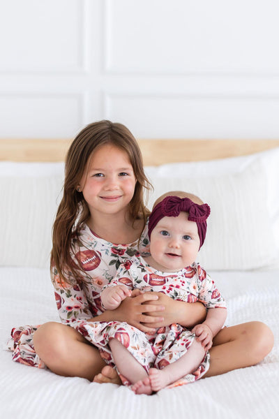 Mila & Rose:  Footballs & Flowers Twirl Bodysuit SHIPS SEPARATELY