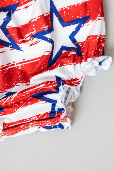 Mila & Rose:  Stars & Stripes Ruffle Cross Back Romper SHIPS SEPARATELY