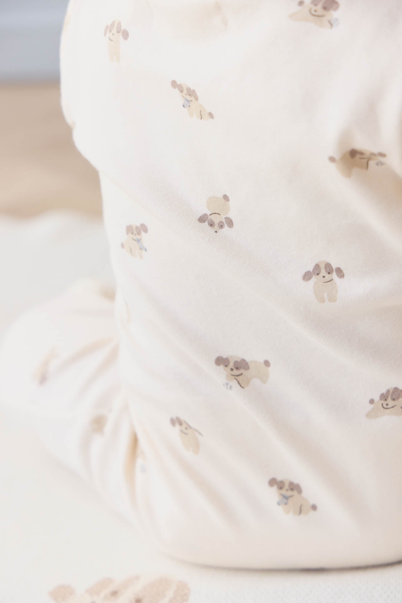 Jamie Kay Zip Onepiece: Sasha Puppy Tofu