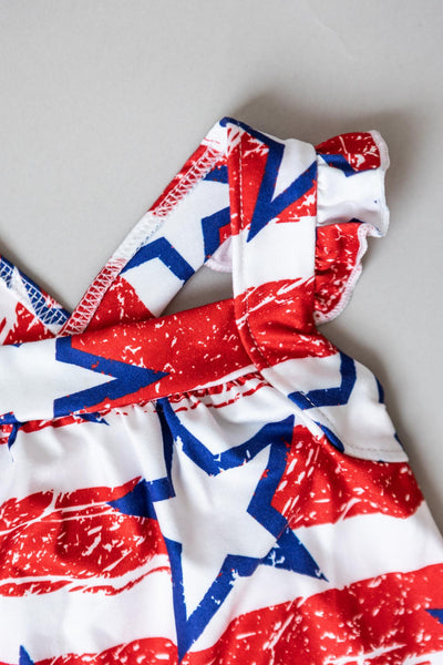 Mila & Rose:  Stars & Stripes Ruffle Cross Back Romper SHIPS SEPARATELY
