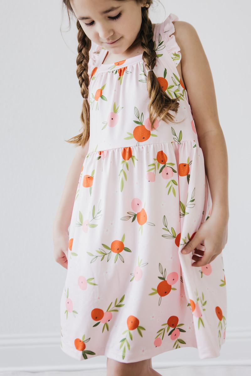 Mila & Rose:  Tangerine Ruffle Cross Back Dress SHIPS SEPARATELY
