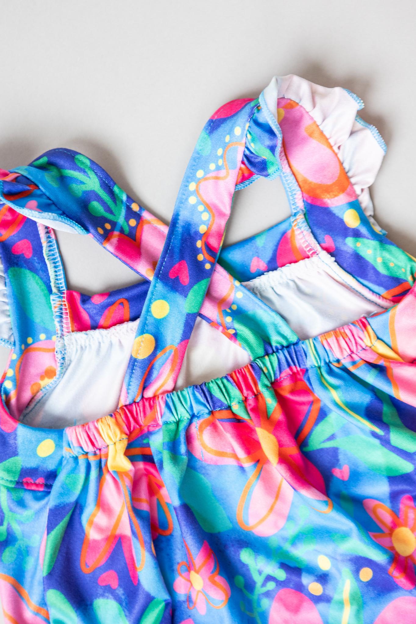 Mila & Rose:  Springing Around Ruffle Cross Back Romper SHIPS SEPARATELY