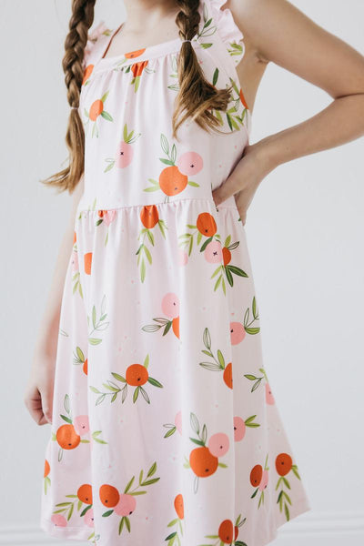 Mila & Rose:  Tangerine Ruffle Cross Back Dress SHIPS SEPARATELY