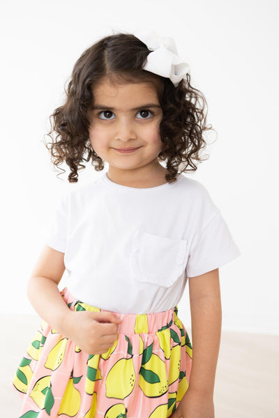 Mila & Rose:  White Ruffle Pocket Tee SHIPS SEPARATELY
